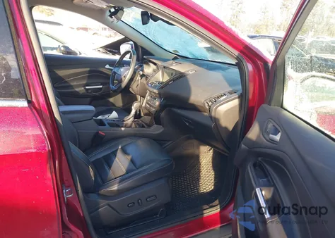 2017 Ford Escape Titanium z USA, uszkodzony, nr VIN 1FMCU0J98HUC98957